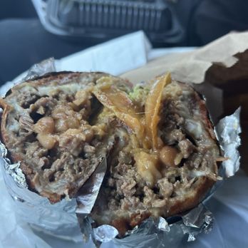 Tequileros Taqueria - Super burrito asada with grilled onions, guacamole and cheese crust - Mexican Near Me - Patterson, California Tequileros Taqueria - Super burrito asada with grilled onions, guacamole and cheese crust - Mexican Near Me - Patterson, California