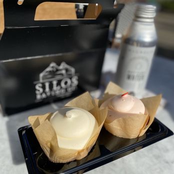Silos Baking - Red velvet cupcake w/ cream cheese icing and a chocolate cupcake with strawberry purée buttercream icing. - Cupcakes Near Me - Waco, Texas Silos Baking - Red velvet cupcake w/ cream cheese icing and a chocolate cupcake with strawberry purée buttercream icing. - Cupcakes Near Me - Waco, Texas