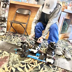 Outdoor Adventure Center - my Son trying on some SNOWBOARDS