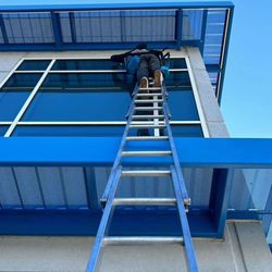 JM Window Cleaning - Detailed Hand Window Cleaning for Commercial Buildings - Frame Cleaning and wipe down for a spotless, polished look.