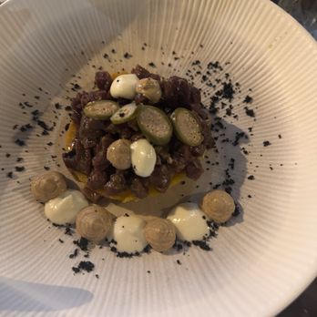 El Traga - TARTAR DE TERNERA NACIONAL, POLENTA CRUJIENTE, PIÑONES, PURÉ DE MANZANA - Tapas Bars Near Me - Seville, SE El Traga - TARTAR DE TERNERA NACIONAL, POLENTA CRUJIENTE, PIÑONES, PURÉ DE MANZANA - Tapas Bars Near Me - Seville, SE