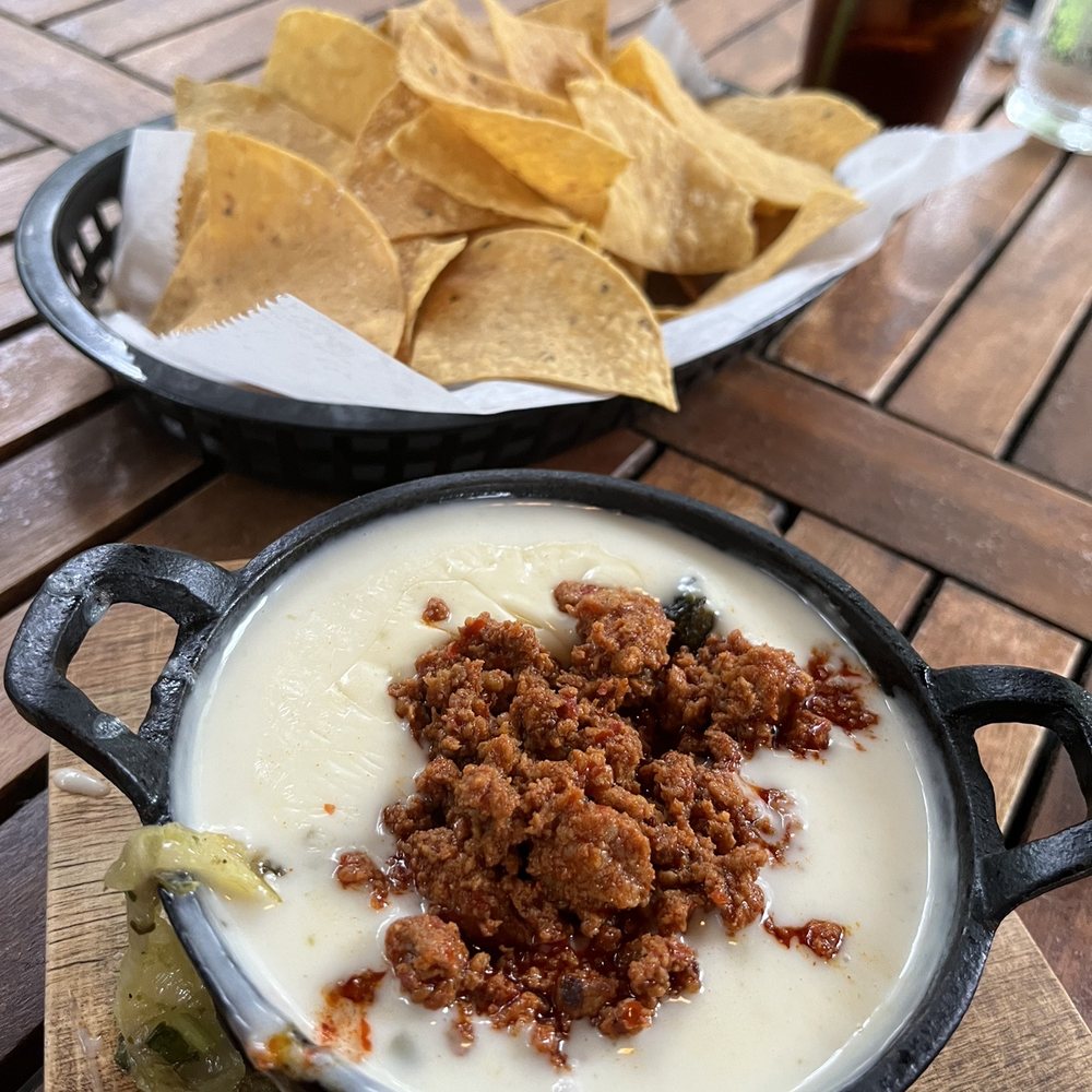 Nopal - Queso Fundido with Chorizo and chips - Mexican Near Me - Gainesville, Florida Nopal - Queso Fundido with Chorizo and chips - Mexican Near Me - Gainesville, Florida