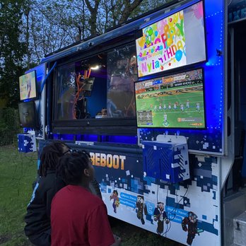 Pixel Reboot - Kids Playing Madden on the outside TVs! - Game Truck Rental Near Me - Jersey City, New Jersey Pixel Reboot - Kids Playing Madden on the outside TVs! - Game Truck Rental Near Me - Jersey City, New Jersey