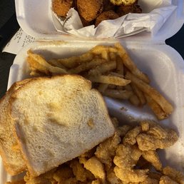 Large Catfish nuggets and fries, hush puppies and bread Large Catfish nuggets and fries, hush puppies and bread