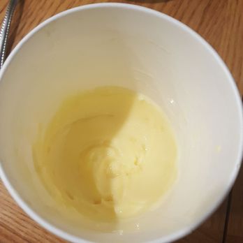 Pinkberry - What's left. It fills about 1/4 of the container. - Ice Cream & Frozen Yogurt Near Me - Folsom, California