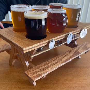 Contentment Brewing - Flight holders are very unique. - Breweries Near Me - Modesto, California
