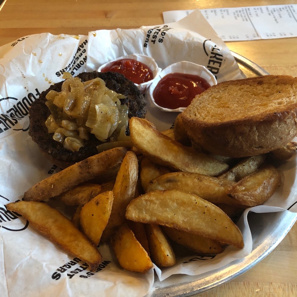 Fuddruckers - 1/2 lbs burger on wheat with grilled onions - Burgers Near Me - Branson, Missouri Fuddruckers - 1/2 lbs burger on wheat with grilled onions - Burgers Near Me - Branson, Missouri