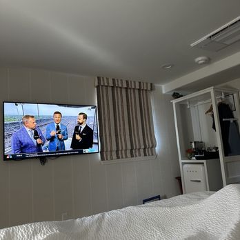 Paso Robles Inn - Cords hanging from under the tv... - Hotels Near Me - Paso Robles, California