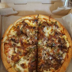 Pizza Palace - Small cheese pizza with steak, peppers, and onion.