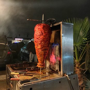 Tacos Los Chavalones - a taco being cooked - Tacos Near Me Tacos Los Chavalones - a taco being cooked - Tacos Near Me