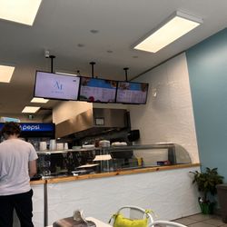 Shawarma AL Mouna - The menu and the counter.