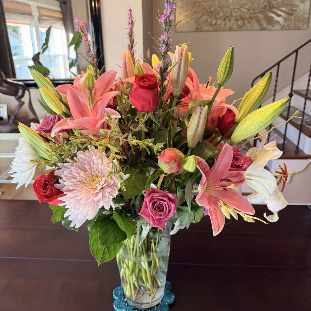 Peonies, lilies, red and pink roses, and more. Peonies, lilies, red and pink roses, and more.