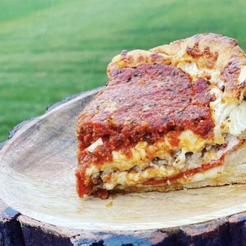 The DC Chi Pie - a slice taken out of it - Pizza Near Me - Washington, DC, District of Columbia