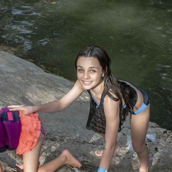 Krause Springs - Caught Helping Her Little Sister - Campgrounds Near Me - Spicewood, Texas