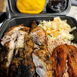 Jamaica Paradise Kitchen - Jerk Chicken plate with cabbage, plantains, and rice and beans.  Also a beef patty on top.