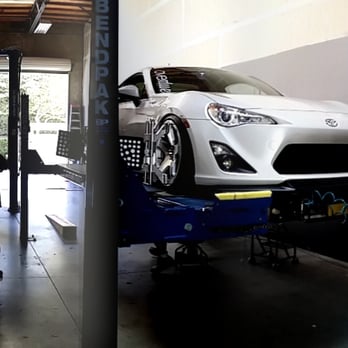 Accurate Alignments and Service - Lowered Scion FR-S with front lip on alignment rack - Auto Repair Near Me - Oceanside, California