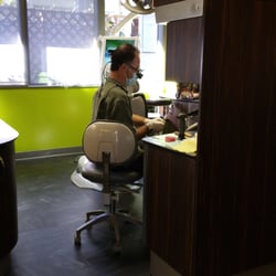 Palm Dental Care - Our dentist hard at work.