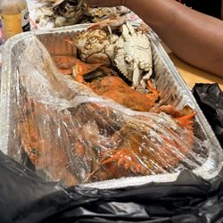 Bamm-Bamm’s Fresh Seafood Market - Dozen of blue crabs mixed male and females