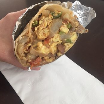 Corner Burger - Veggie breakfast burrito. $7. The mushrooms in it was canned so I can't rate it very high. Also tomatoes made it watery. - Burgers Near Me - Lawndale, California