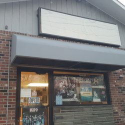 Revolution Records - There is a readable sign in the parking lot