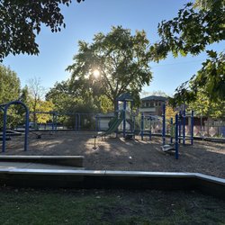 Obstacle course, monkey bars, seesaw, treehouse style unit for little kids.