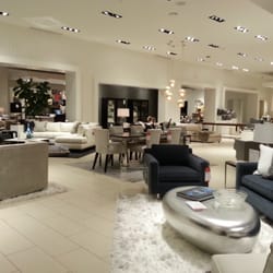 Mitchell Gold + Bob Williams Home Furnishings - I am enamored with the big silver bean like coffee table.