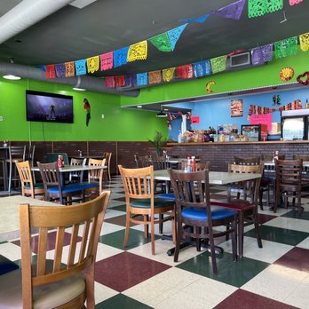Taqueria Del Barrio - tables and chairs in a restaurant - Tacos Near Me - Indianapolis, Indiana Taqueria Del Barrio - tables and chairs in a restaurant - Tacos Near Me - Indianapolis, Indiana