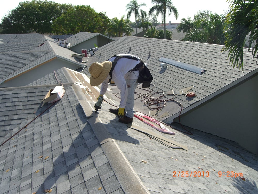 Slide of Heron Bay Roofing