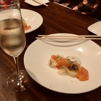 Uchi Houston - Salmon sashimi with golden kiwi, candied ginger on top, and coconut Thai chili sauce - Sushi Bars Near Me - Houston, Texas Uchi Houston - Salmon sashimi with golden kiwi, candied ginger on top, and coconut Thai chili sauce - Sushi Bars Near Me - Houston, Texas