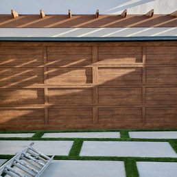 Exterior outside entrance of Cityscape Garage Doors - Martin, steel Pinnacle in walnut finish. - Costa Mesa, California Exterior outside entrance of Cityscape Garage Doors - Martin, steel Pinnacle in walnut finish. - Costa Mesa, California