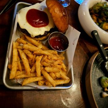 Tavern 157 - Waygu 8 oz burger and truffle fries. Medium well. Excellent tasting burger. buns were toasted. - Lounges Near Me - Flushing, New York Tavern 157 - Waygu 8 oz burger and truffle fries. Medium well. Excellent tasting burger. buns were toasted. - Lounges Near Me - Flushing, New York