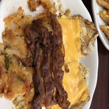 L M Cafe - Fried eggs with cheese, bacon well done and home fries well done - Coffee & Tea Near Me - Long Island City, New York