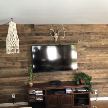 Vintage Timberworks - a living room with a flat screen tv - Building Supplies Near Me - Temecula, California Vintage Timberworks - a living room with a flat screen tv - Building Supplies Near Me - Temecula, California