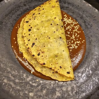 Xokol - Doblada de platano y mole Mazahua rellena de hongos y costilla - Mexican Near Me - Guadalajara, JAL