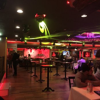 Bonfire Restaurant And Lounge - People in their sections with their bottle service as we wait for an "open" spot. - Caribbean Near Me - Paterson, New Jersey Bonfire Restaurant And Lounge - People in their sections with their bottle service as we wait for an "open" spot. - Caribbean Near Me - Paterson, New Jersey