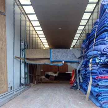 King’s Transfer Van Lines - Truck before loading the furniture. Did not know what all the blue pads were for at first. They used them to wrap the furniture. - Movers Near Me - Dorval, Quebec King’s Transfer Van Lines - Truck before loading the furniture. Did not know what all the blue pads were for at first. They used them to wrap the furniture. - Movers Near Me - Dorval, Quebec
