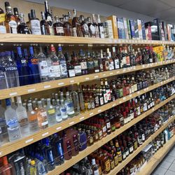 Country Liquor - Many assorted drinks and cigars or even wraps