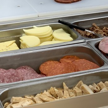 Subway - several trays of different types of meat and cheese - Sandwiches Near Me - Mokena, Illinois
