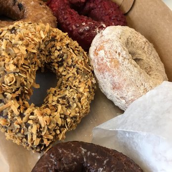 Spunky Dunkers Donuts - The toasted coconut on chocolate donut provided the right amount of crunch - Donuts Near Me - Palatine, Illinois