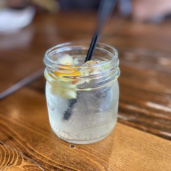 Klom Klorm - a glass of water with ice and a spoon - Thai Near Me - Brooklyn, New York