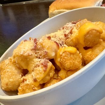 Wahlburgers - SPICY CHEESE & BACON TOTS - Burgers Near Me - Springfield, Massachusetts Wahlburgers - SPICY CHEESE & BACON TOTS - Burgers Near Me - Springfield, Massachusetts