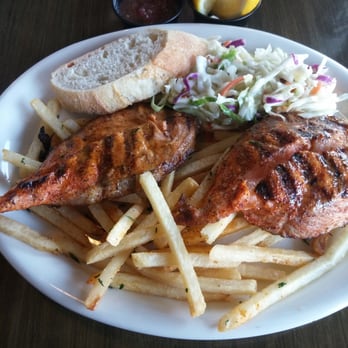 California Fish Grill - Salmon grilled with a Cajun seasoning. French fries, Coleslaw, & a slice of Bread. - Seafood Near Me - Brea, California California Fish Grill - Salmon grilled with a Cajun seasoning. French fries, Coleslaw, & a slice of Bread. - Seafood Near Me - Brea, California