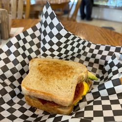 Country Morning Bakery & Cafe  - Custom Breakfast Sandwich. Sourdough, egg, bacon, and avocado