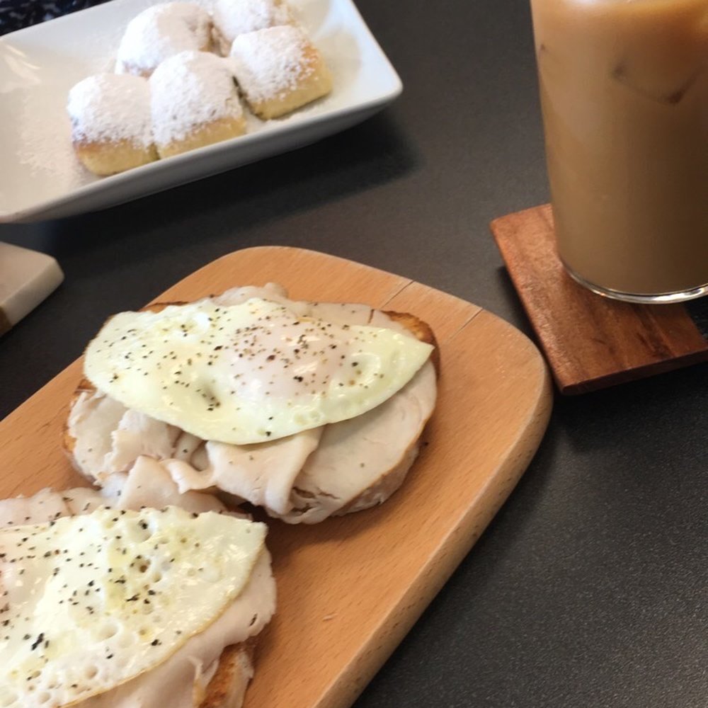 Cafe Flore - New Orleans Beignet, Sunny side turkey Toast, Iced Coffee - Breakfast & Brunch Near Me - Fort Myers, Florida Cafe Flore - New Orleans Beignet, Sunny side turkey Toast, Iced Coffee - Breakfast & Brunch Near Me - Fort Myers, Florida
