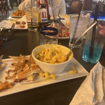 Salty Steer - a man sitting at a table with a bowl of macaroni and cheese - Steakhouses Near Me - Wall, South Dakota Salty Steer - a man sitting at a table with a bowl of macaroni and cheese - Steakhouses Near Me - Wall, South Dakota