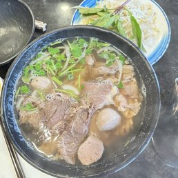 large house special, with rare steak, brisket, fatty flank, tendon, tripe and beef ball large house special, with rare steak, brisket, fatty flank, tendon, tripe and beef ball
