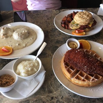 Sage Biscuit Cafe - Half order of biscuit and gravy, side of grits, chicken and waffle, and the chicken biscuit (sandwich). All was Yummy in my tummy!!! - Breakfast & Brunch Near Me - Bradenton, Florida Sage Biscuit Cafe - Half order of biscuit and gravy, side of grits, chicken and waffle, and the chicken biscuit (sandwich). All was Yummy in my tummy!!! - Breakfast & Brunch Near Me - Bradenton, Florida