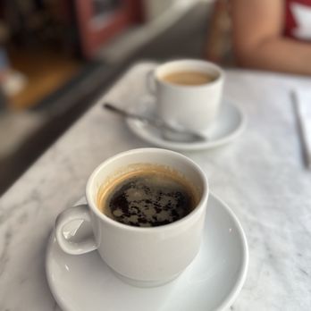Café Campagne - two cups of coffee on a table - French Near Me - Seattle, Washington Café Campagne - two cups of coffee on a table - French Near Me - Seattle, Washington