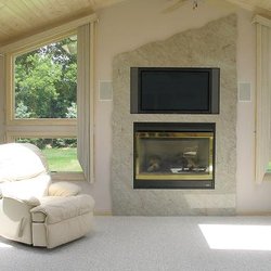 Listening Room - We work with your builder or architect every step of the way . .  TV install surrounded by granite.