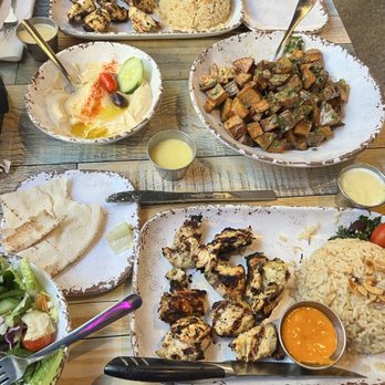Sittay's Mediterranean Kitchen - Hummus w/ pita, potato mtafia, and the chicken kabob plate with side salad - YUM - Mediterranean Near Me - Greensburg, Pennsylvania